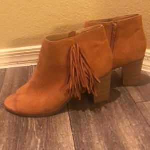 Open toed booties with tassels
